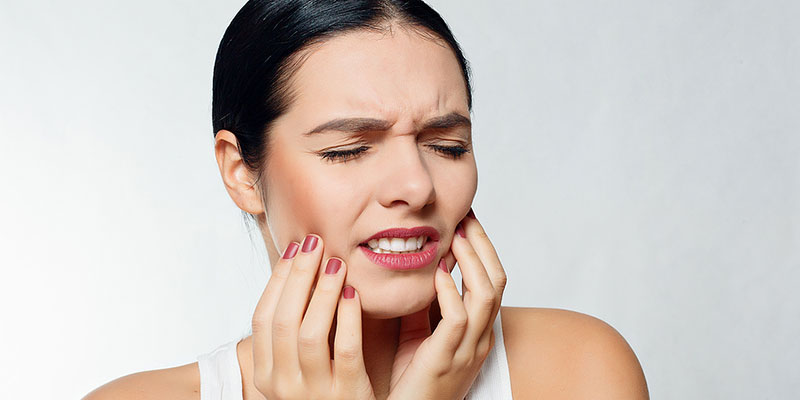 Woman with jaw pain in Gresham OR